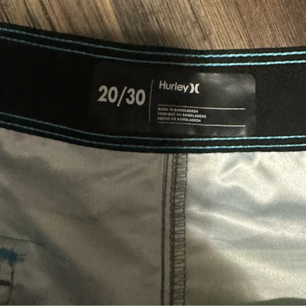 Hurley blue lazer tropical board shorts Swim trunks size 20 /30